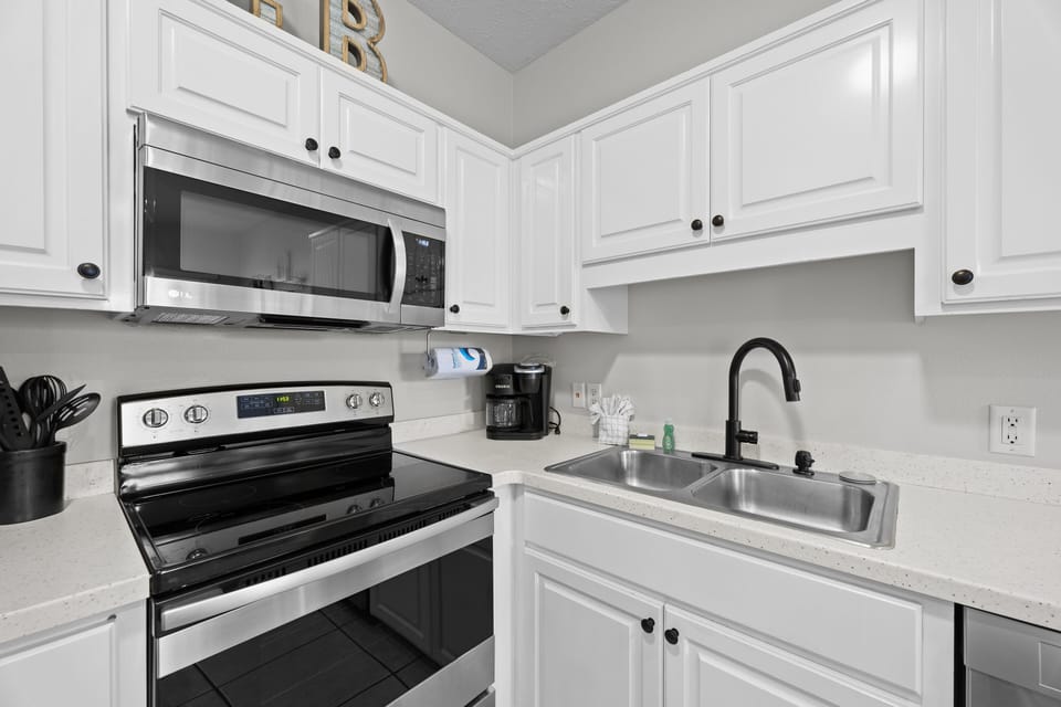 Fully loaded kitchen features Keurig coffee machine. 