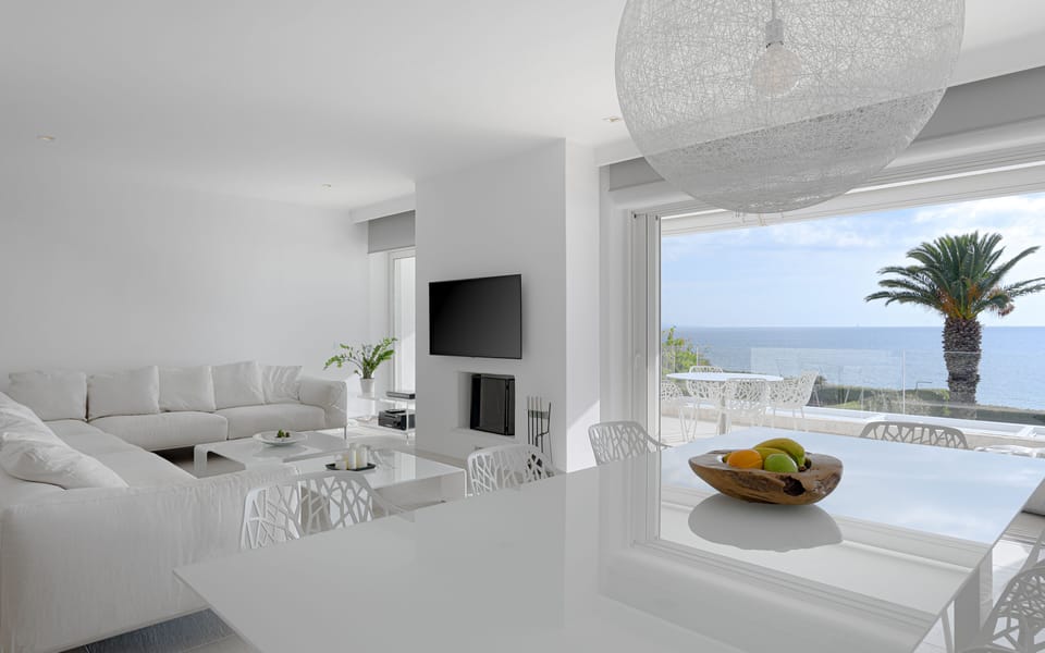 Dinning Area And Living Room One With Balcony