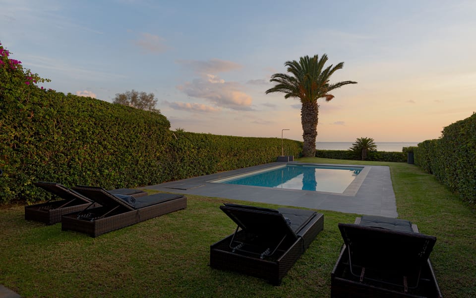 Exterior Dining Area With View To The Pool