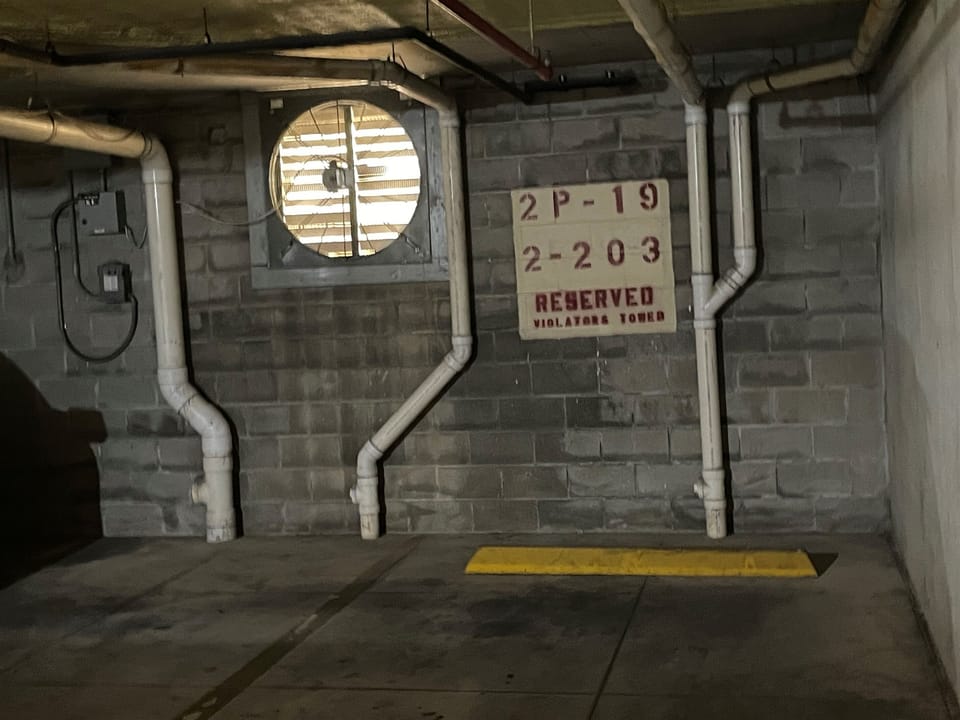 Your designated parking spot awaits in this secure underground garage with convenient reserved space numbering.