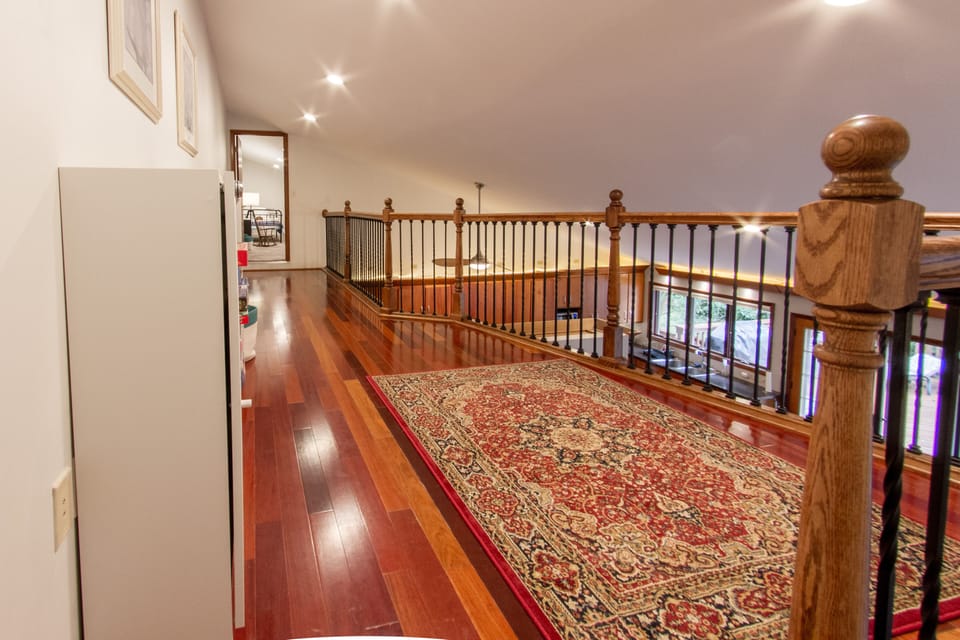 Loft room showing doorway to bedroom