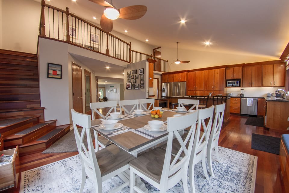 Dining room showing steps to loft.  Dining room seats 8-10