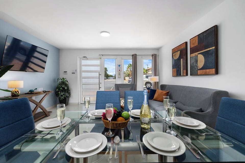 Whether it’s a romantic dinner for two or a lively family feast, this spacious yet cozy dining area provides the perfect ambiance. The open layout seamlessly connects to the kitchen and living area, making every meal feel extra special.