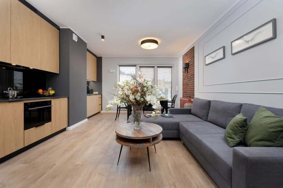 Living room with a comfortable sofa and TV. 