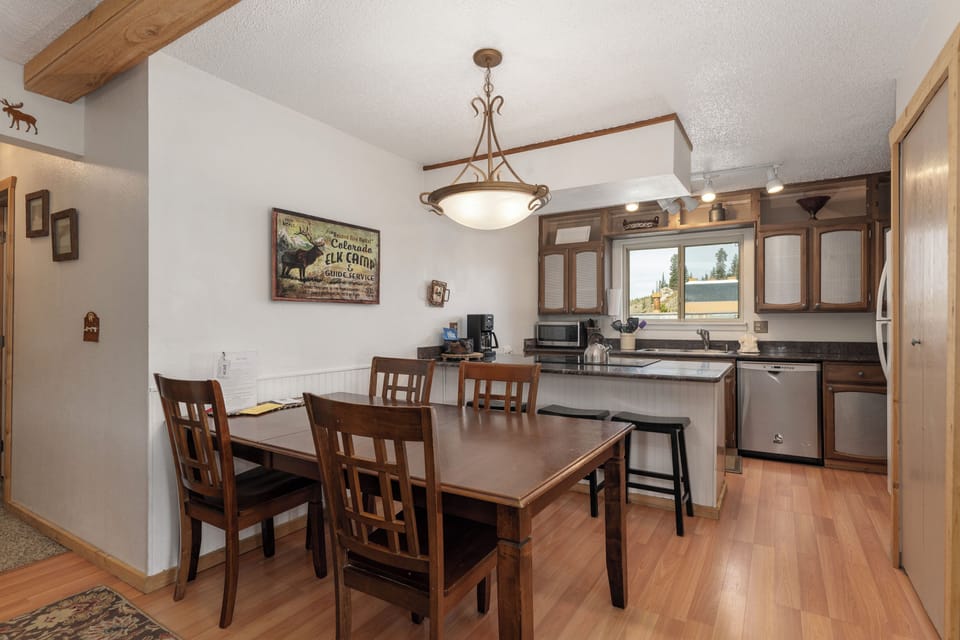 Gather around your spacious dining table while the mountain chef prepares meals in your fully-equipped kitchen.