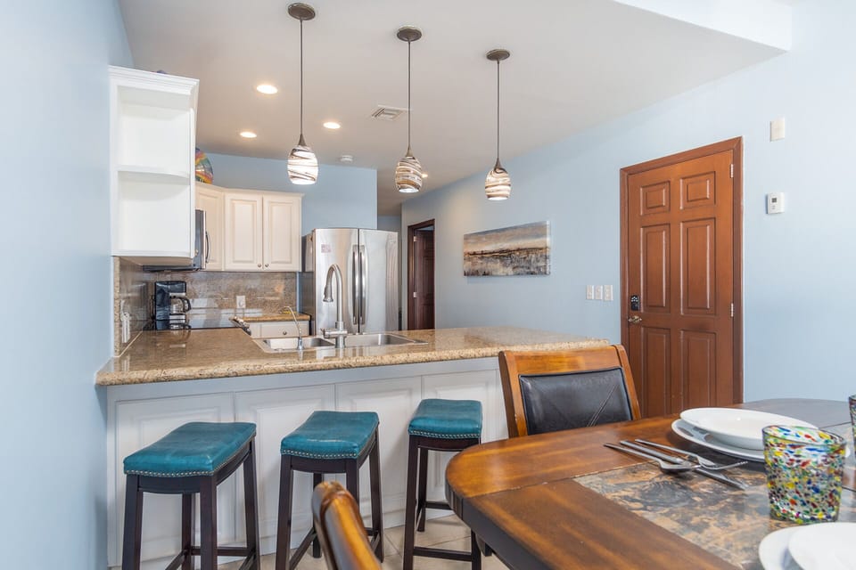 bar stools at counter and dining table