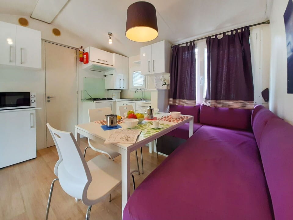 Furniture, Table, Building, Chair, Cabinetry, Purple, Kitchen Appliance, Curtain, Interior Design, Decoration
