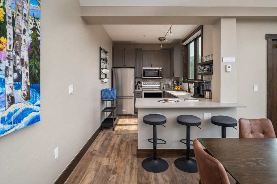 Fully updated kitchen & seating for three at the breakfast bar