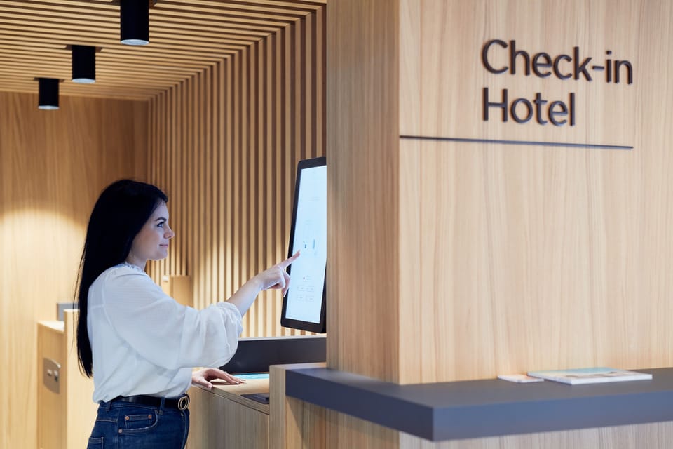 Check-in/check-out kiosk