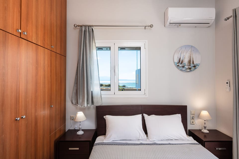 Apartment, 3 Bedrooms, Sea View | 3 bedrooms, in-room safe, soundproofing, iron/ironing board