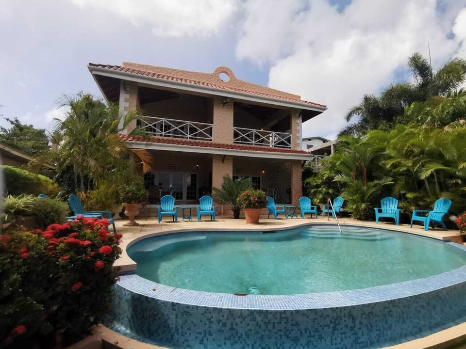 Pride of Courland Tobago Front View with Infinity Edge Salt WaterPool 