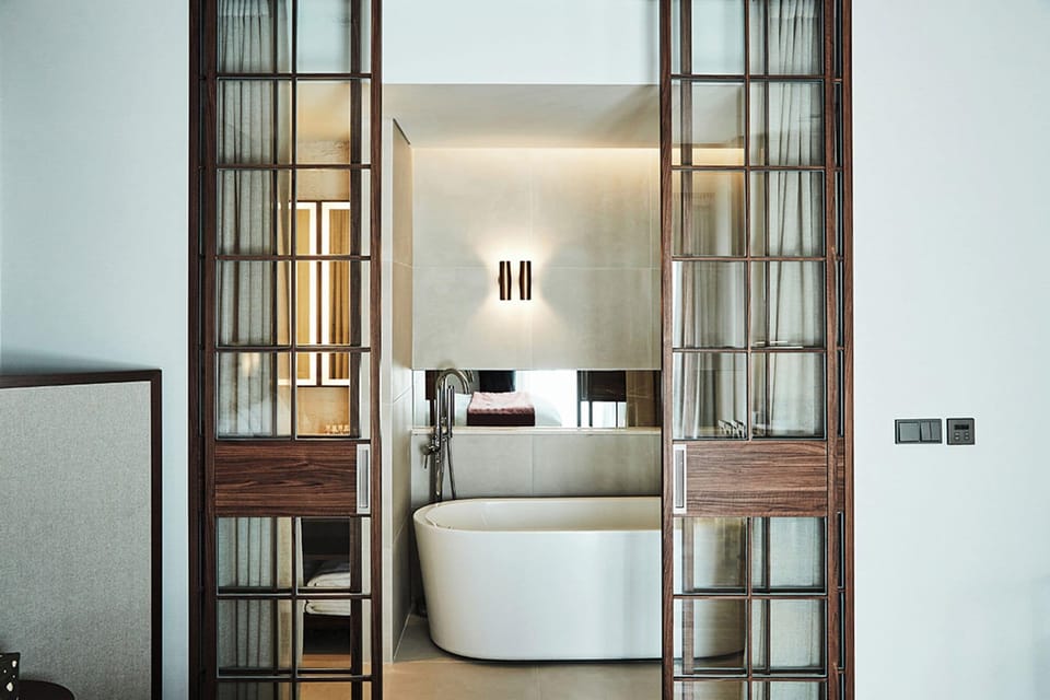 Lacasa Suite | Bathroom | Free toiletries, hair dryer, slippers, towels
