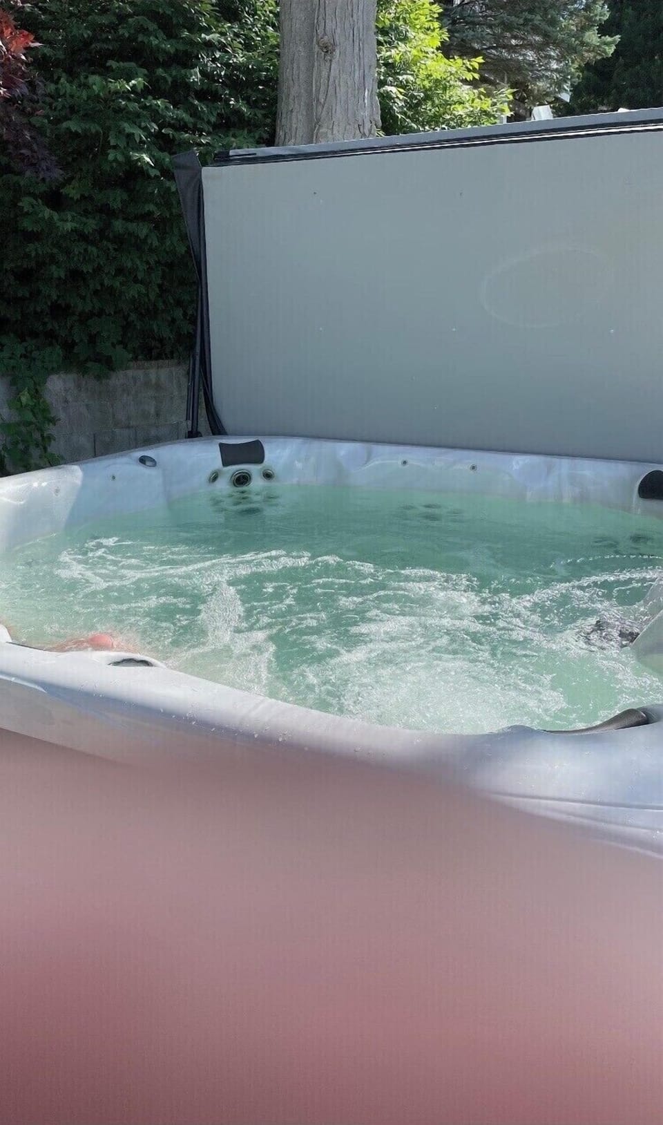 Hot tub on the concrete patio 