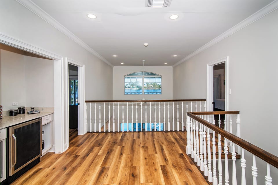 Top of the stairs includes a small coffee bar.
