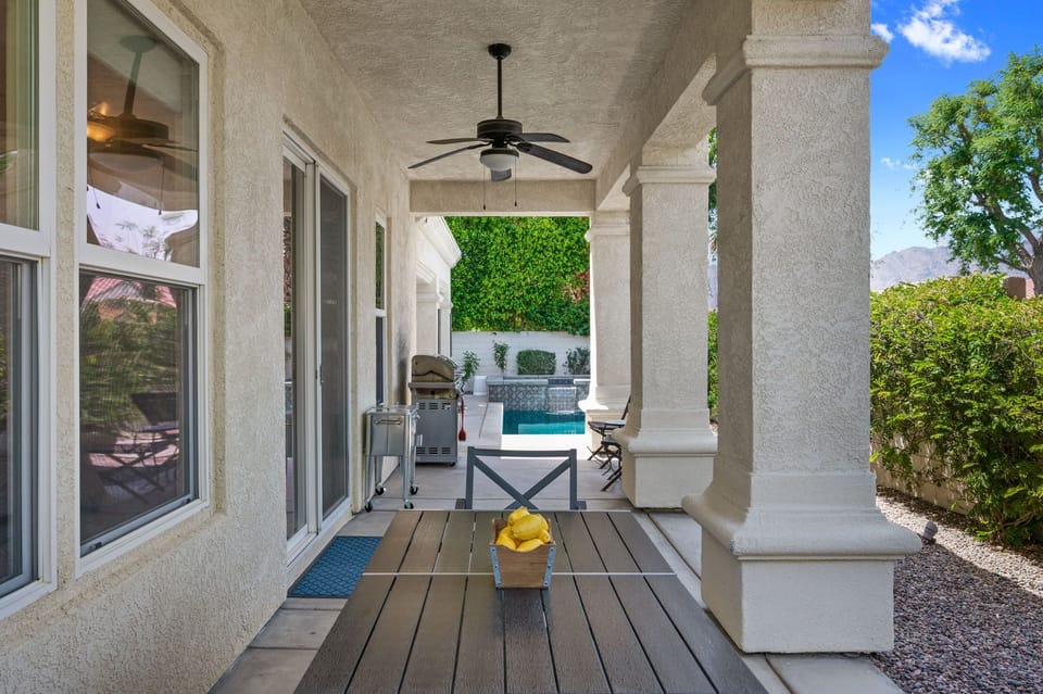 Outdoor dining table, cooler, and bbq