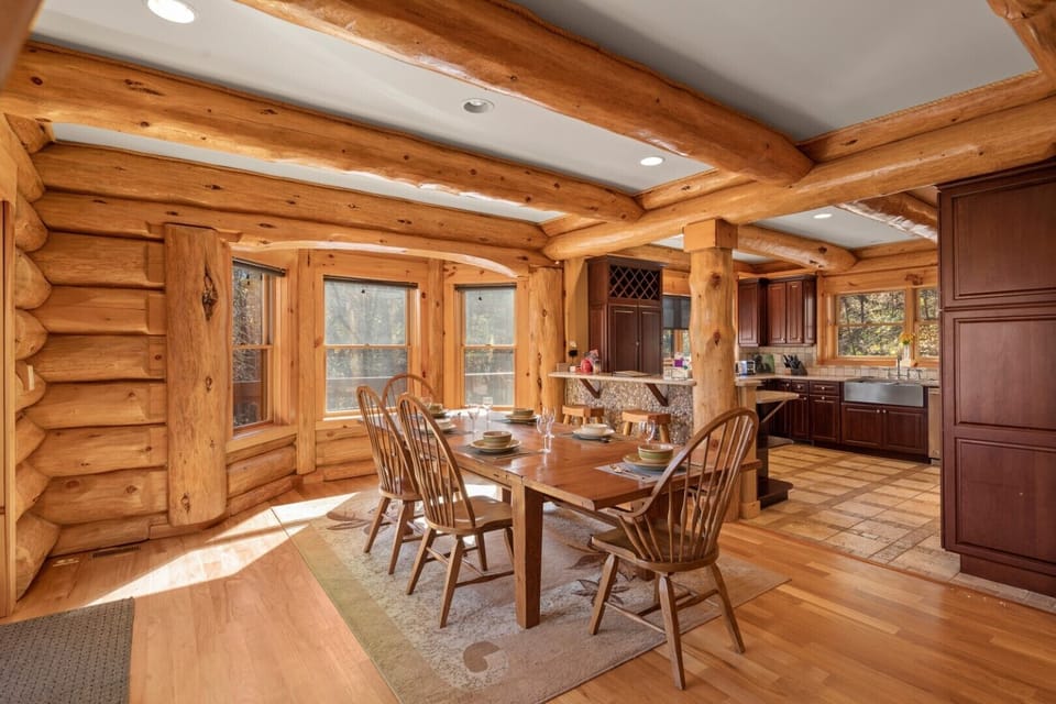 Formal dining area with overflow dining at the breakfast bar.