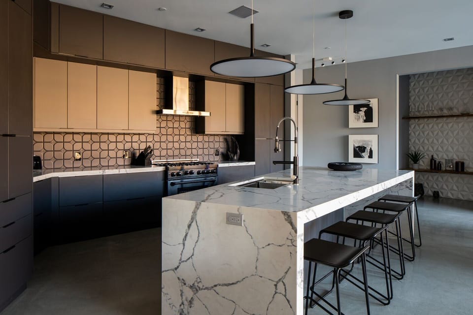 Open kitchen with island that can seat 5 people