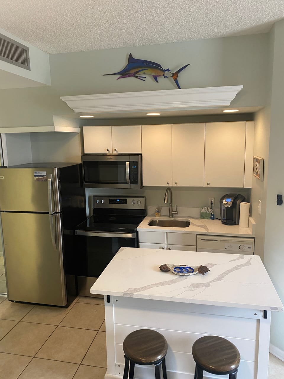 December 2021 Updates: New counters, stove, microwave and bathroom updates.