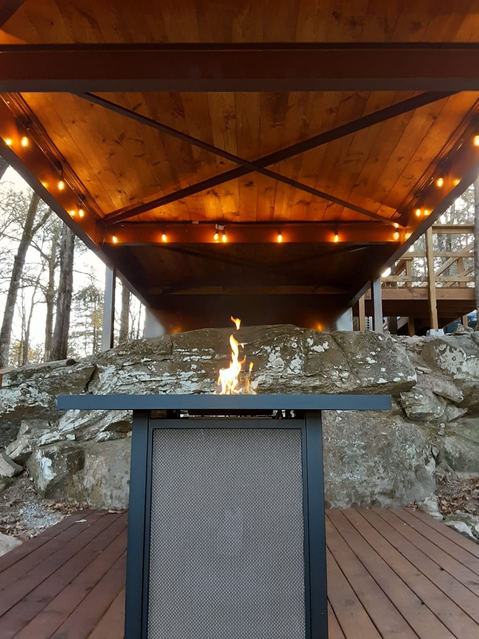 fire table on the covered lower deck for a rainy day 