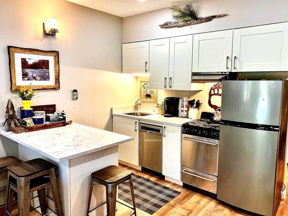 Fully Equipped Remodeled Kitchen with Quartz Countertops and Stainless Appliances