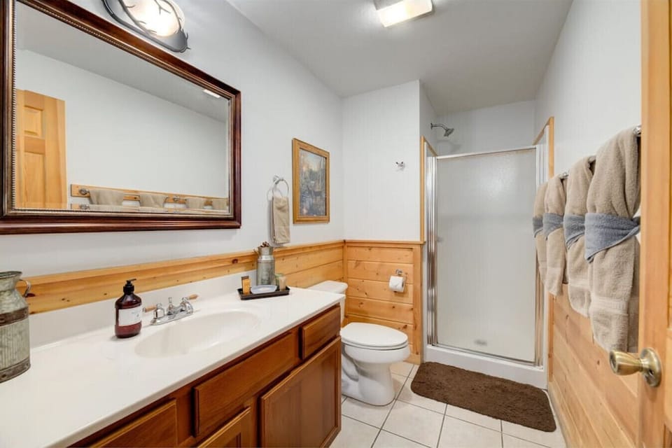 Full bathroom next to 3rd bedroom that opens up to the Game Room.