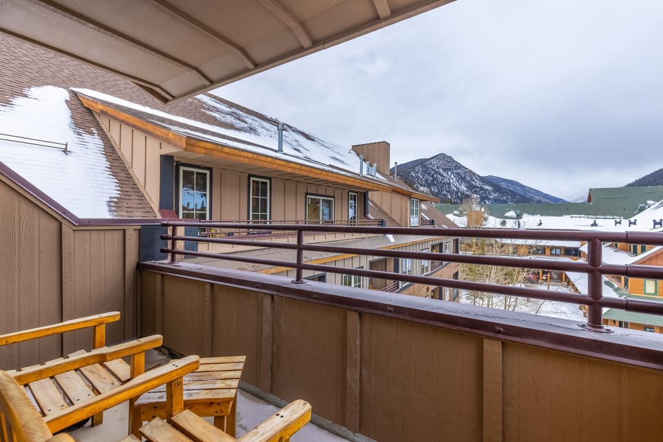 Step onto your private balcony and breathe in crisp mountain air while enjoying stunning winter views of snow-capped peaks.