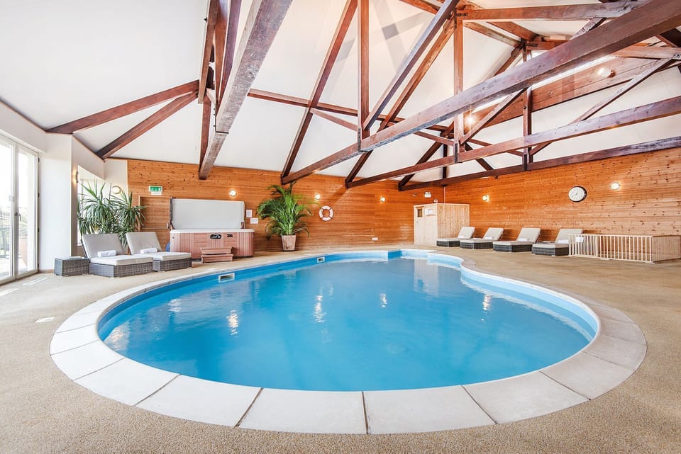 Clydey heated pool area with baby safety pen