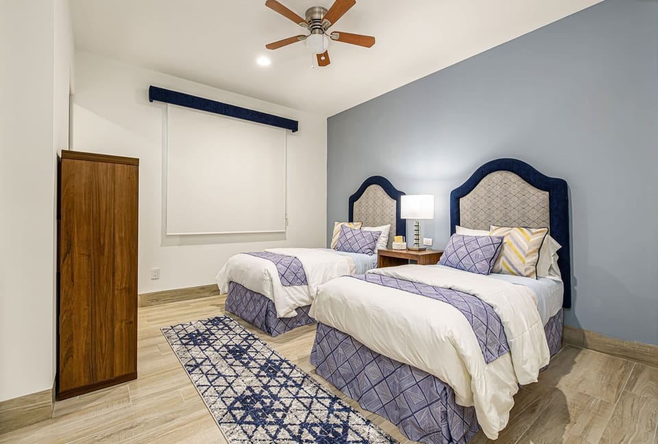 3rd Bedroom with Twin Beds and ensuite bathroom and TV