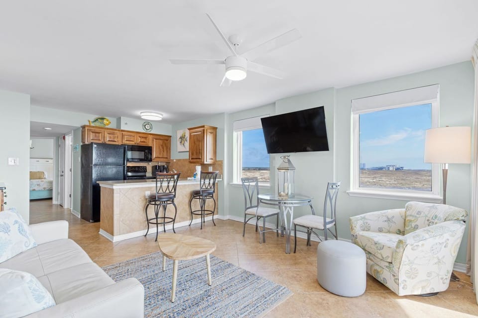 Living Room and kitchen with beautiful views of the State Park.