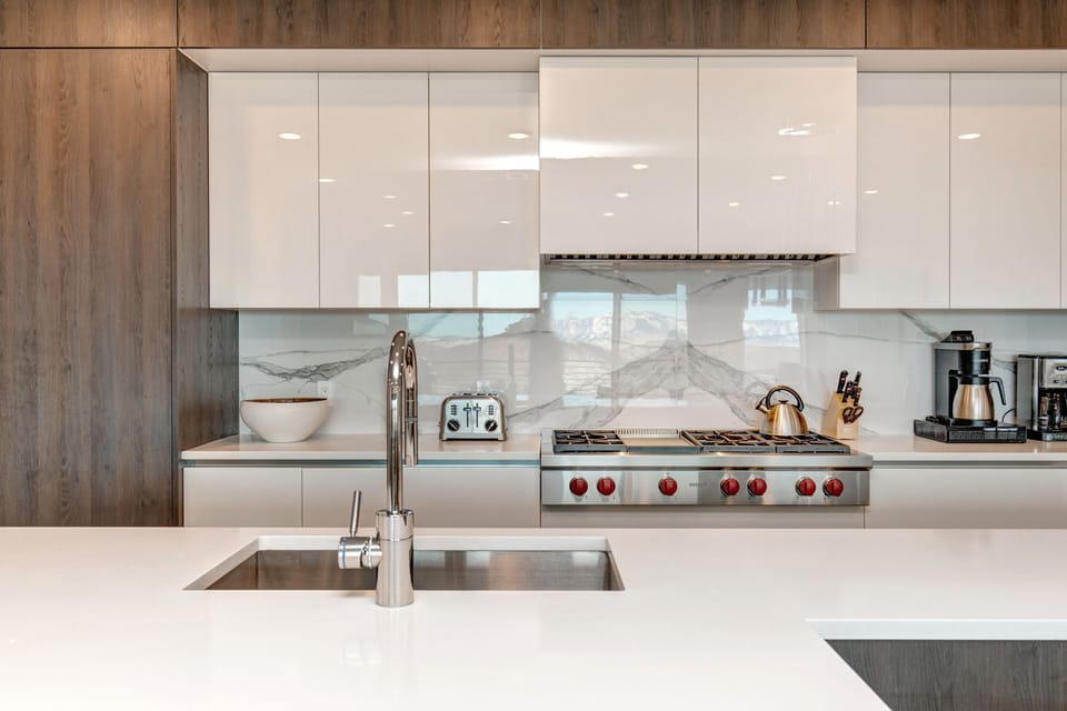 Fully Equipped Gourmet Kitchen Offering a Wolf 6-Burner Stovetop