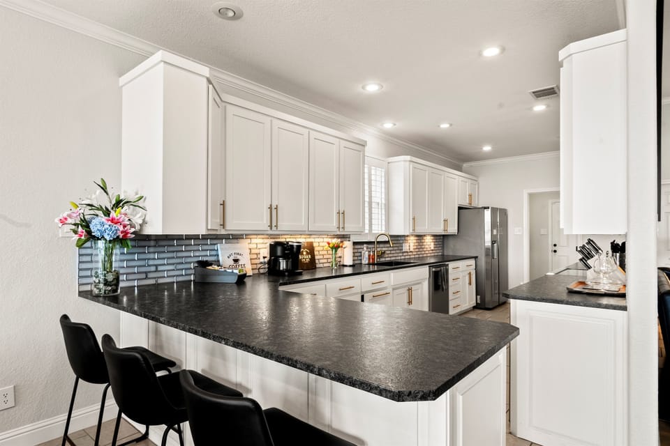Bright, remodeled kitchen with spacious counters—designed to make cooking effortless and enjoyable.