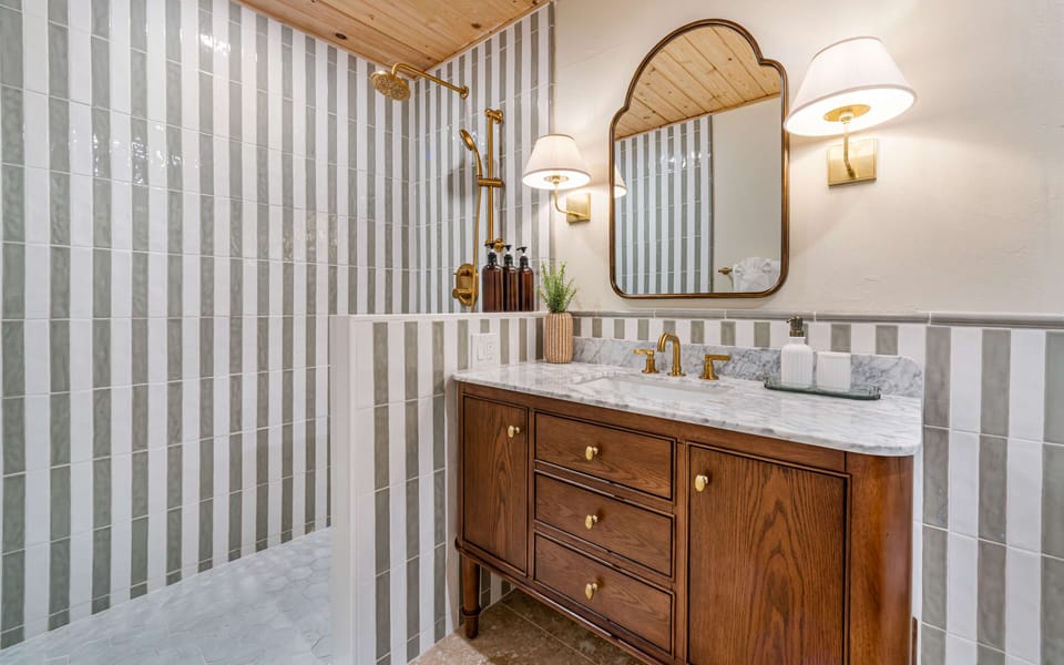 Bright, breezy bathroom with thoughtful island design.