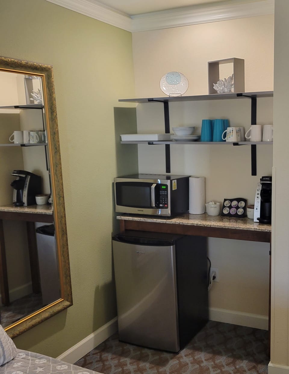 Microwave, mini frig, Keurig and starter pods, cream, sugar and service for four