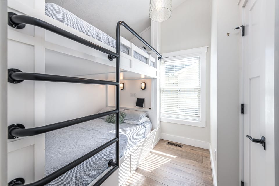 Dual queen bunks that kids love! Each has its own independent TV and lights:)