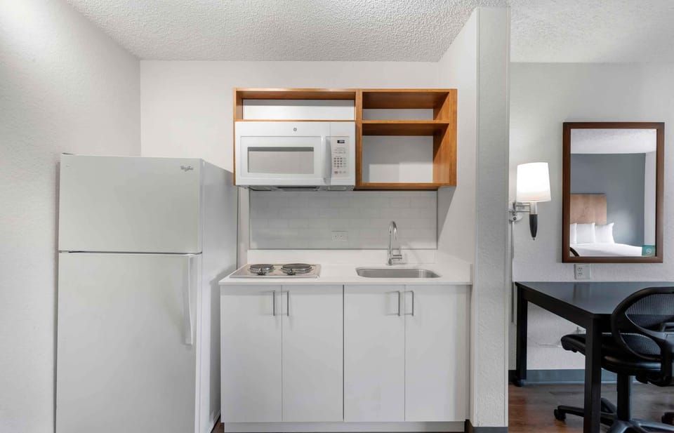 Fridge, microwave, stovetop, coffee/tea maker