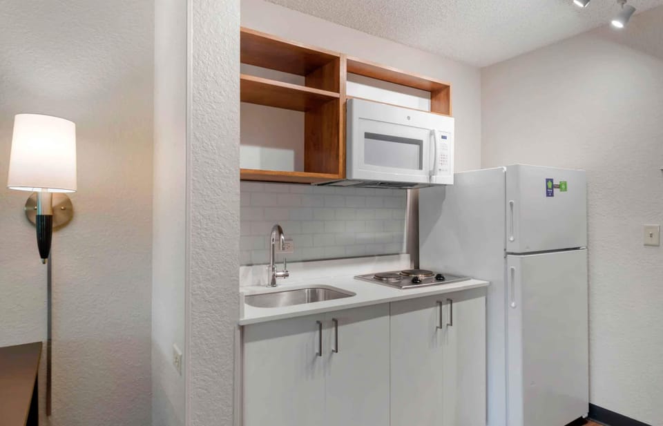 Studio, 1 King Bed, Non Smoking | Private kitchen | Fridge, microwave, stovetop, coffee/tea maker