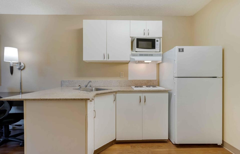 Studio, 1 Queen Bed | Private kitchen | Coffee/tea maker, fridge, microwave, stovetop