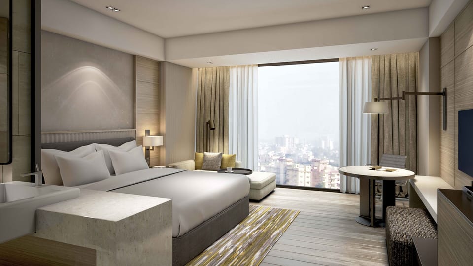 Premium bedding, down comforters, minibar, in-room safe