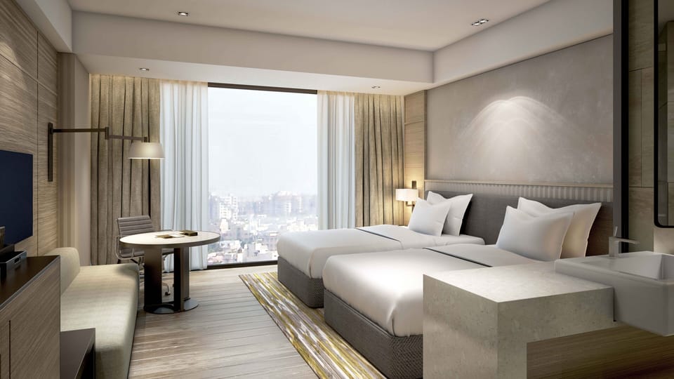 Premium bedding, down comforters, minibar, in-room safe