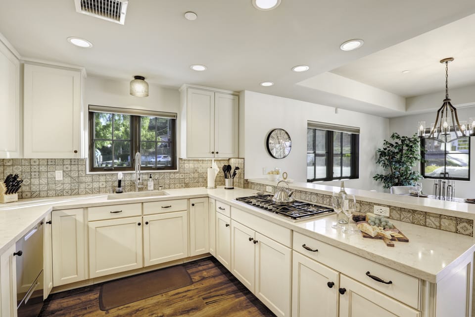 Hardwood floors, quartz countertops, and brisk sea breeze here.