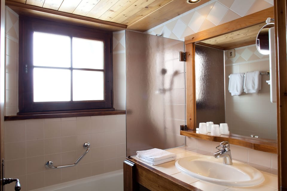 Hair dryer, slippers, towels