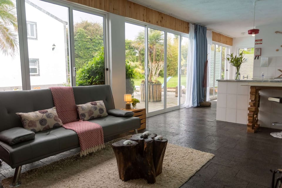 Nature is right outside the door with expansive views of the garden and pool.