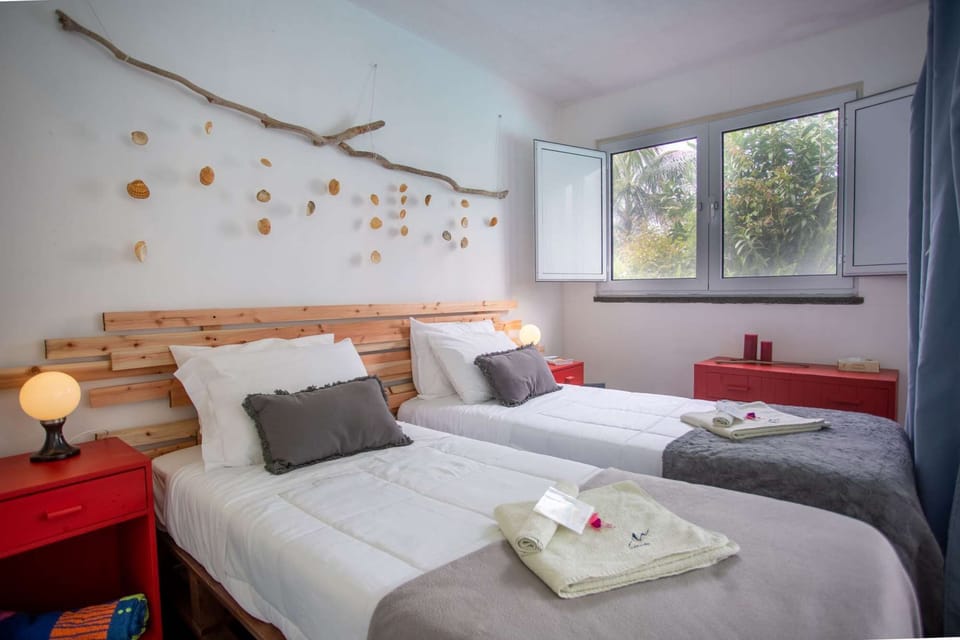 The Wisteria Suite can be configured with a Queen bed or two singles.