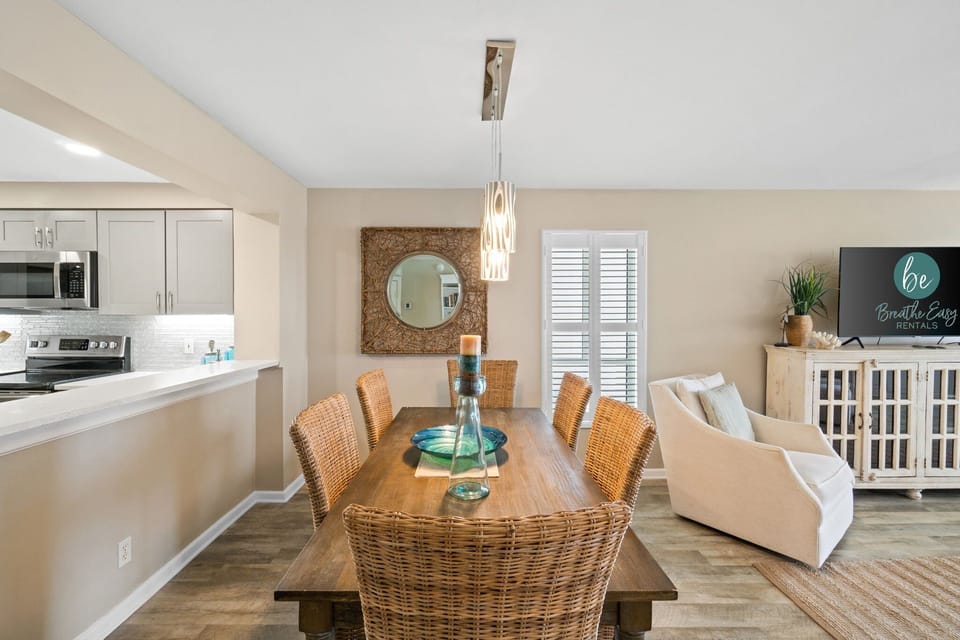 Enjoy your indoor dining, while also enjoying the beautiful Gulf view. Or a friendly game of cards.

Professionally Managed by
Breathe Easy Rentals