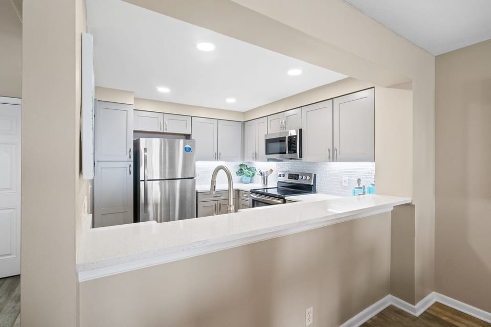Imagine preparing a meal and viewing the Gulf at the same time!

Professionally Managed by
Breathe Easy Rentals