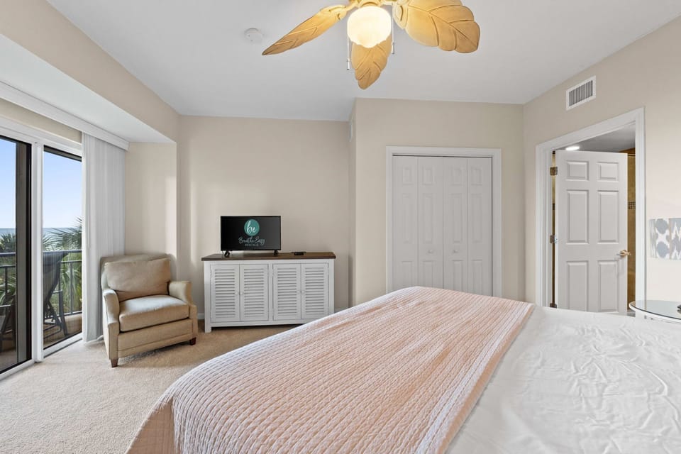 Sleep soundly in a plush king bed with freshly laundered linens.
Chair for ready and flat screen TV with free WiFi.
Professionally Managed by
Breathe Easy Rentals