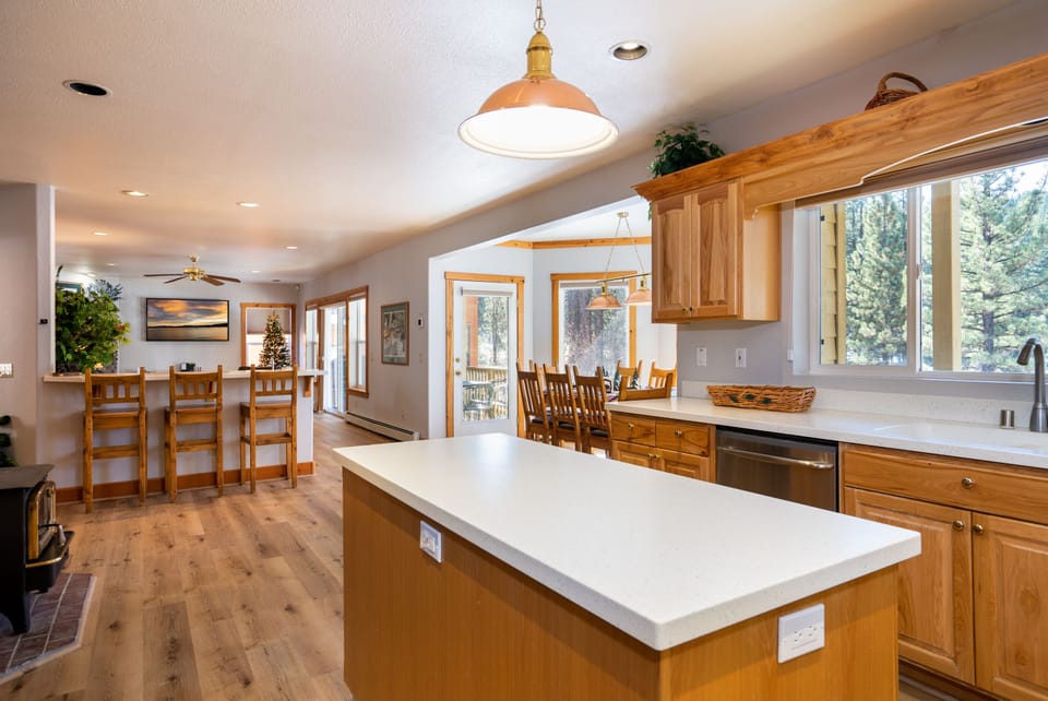 show casing open floor plan of main living area from kitchen