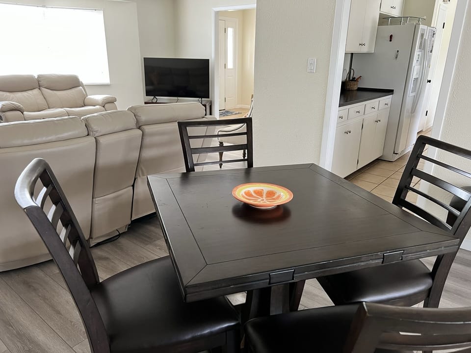 Smaller dining table with fold out leaves.