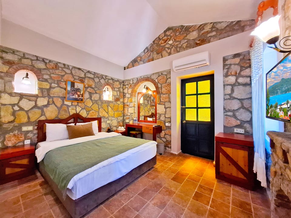 Stone Sea View Standard Room | Premium bedding, in-room safe, soundproofing, iron/ironing board