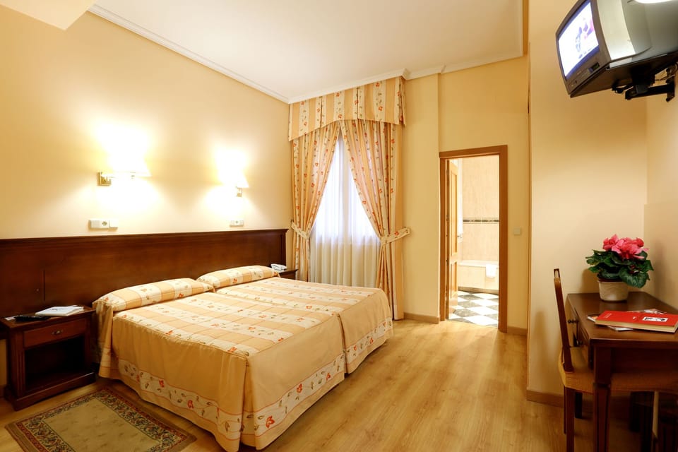 Desk, free WiFi, bed sheets